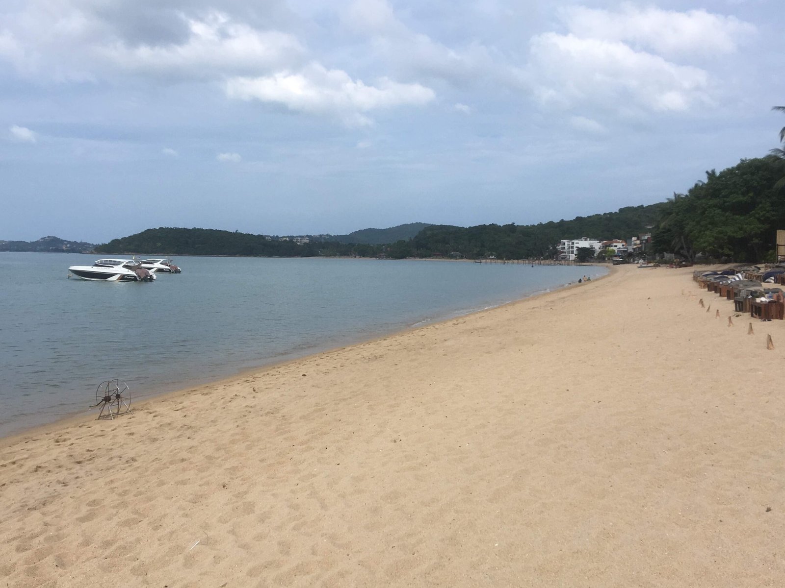 Bophut Beach during the day with calm water and view of the bay