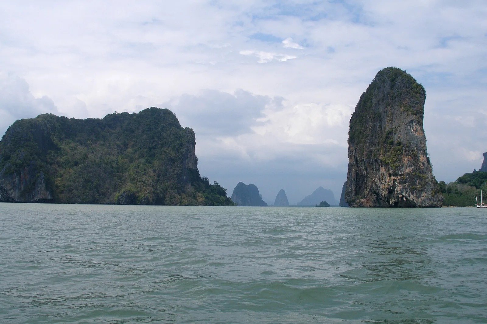Limestone karst formations rising from Phang Nga Bay near Koh Yao Noi