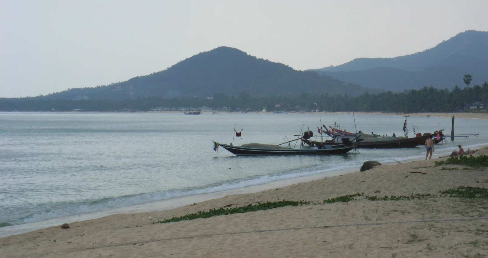 Bophut Beach during the day with calm water and view of the bay