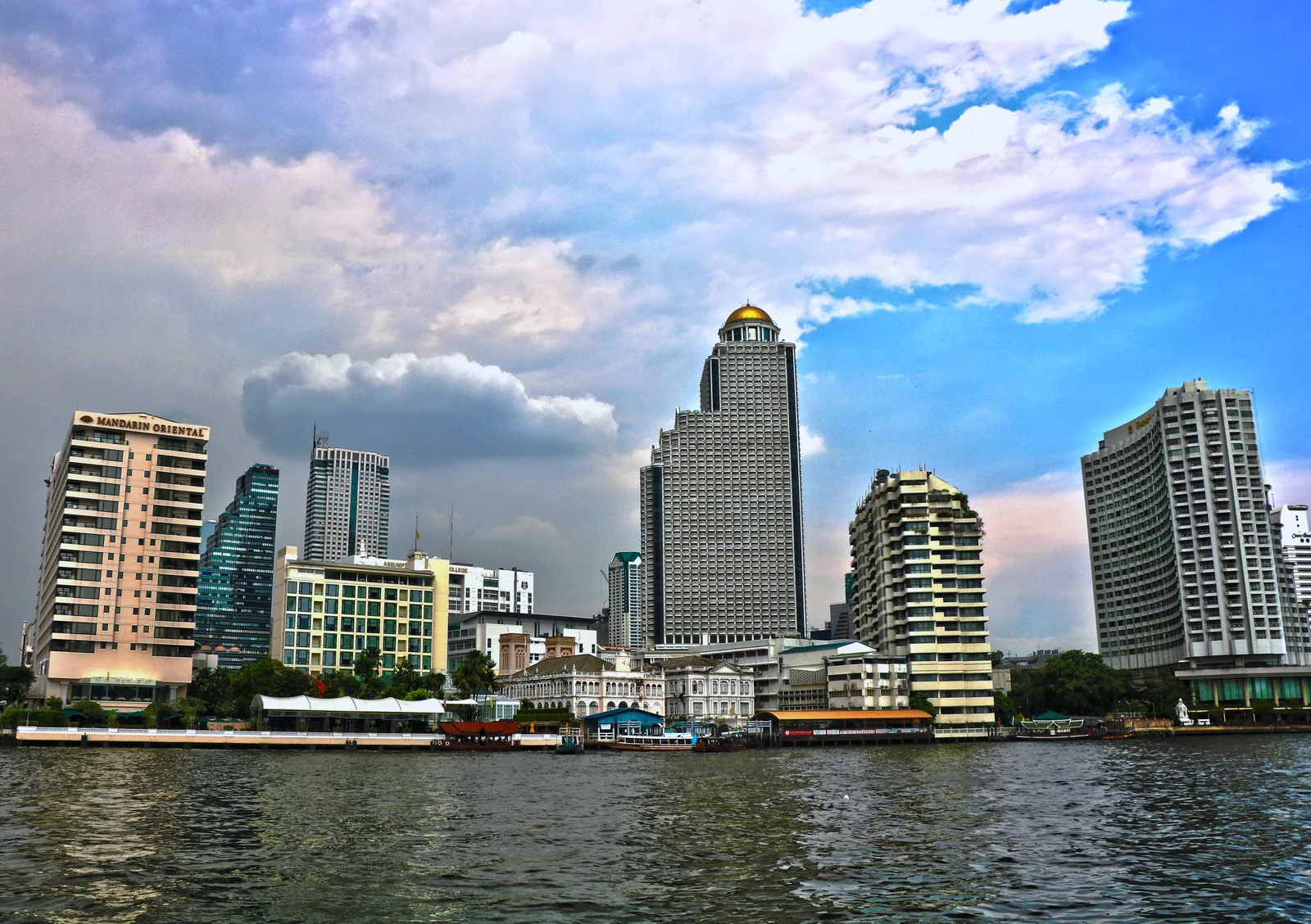 Chao Phraya River along the Bang Rak district Bangkok with Mandarin Oriental and riverside landmarks