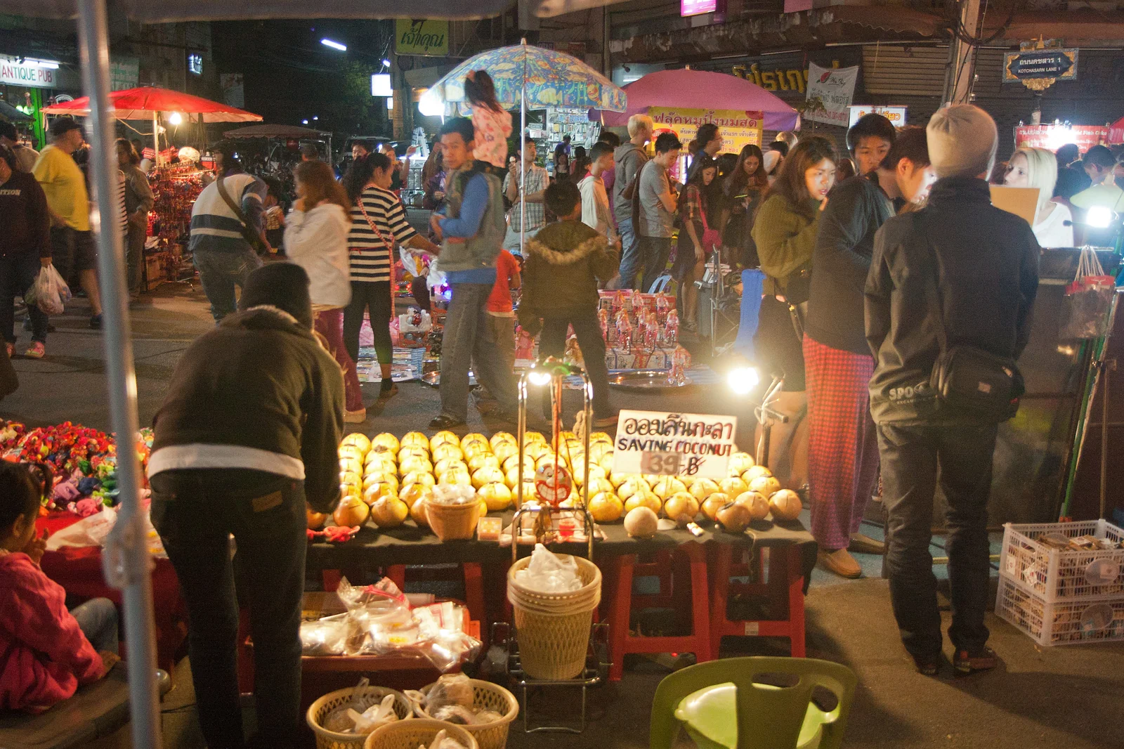 Evening walking street market crowd in Chiang Mai Old City