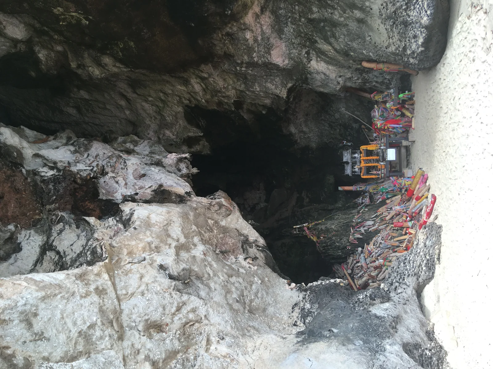 Phra Nang Cave shrine at the foot of the headland on Phra Nang Beach, Krabi