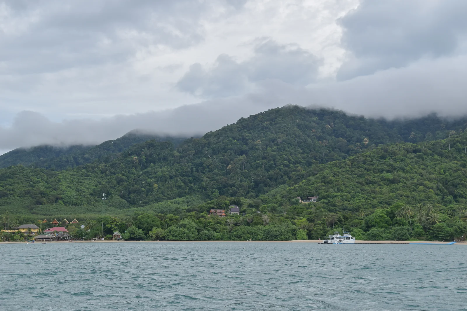 Quiet beach and forested coastline on Koh Lanta in Krabi province
