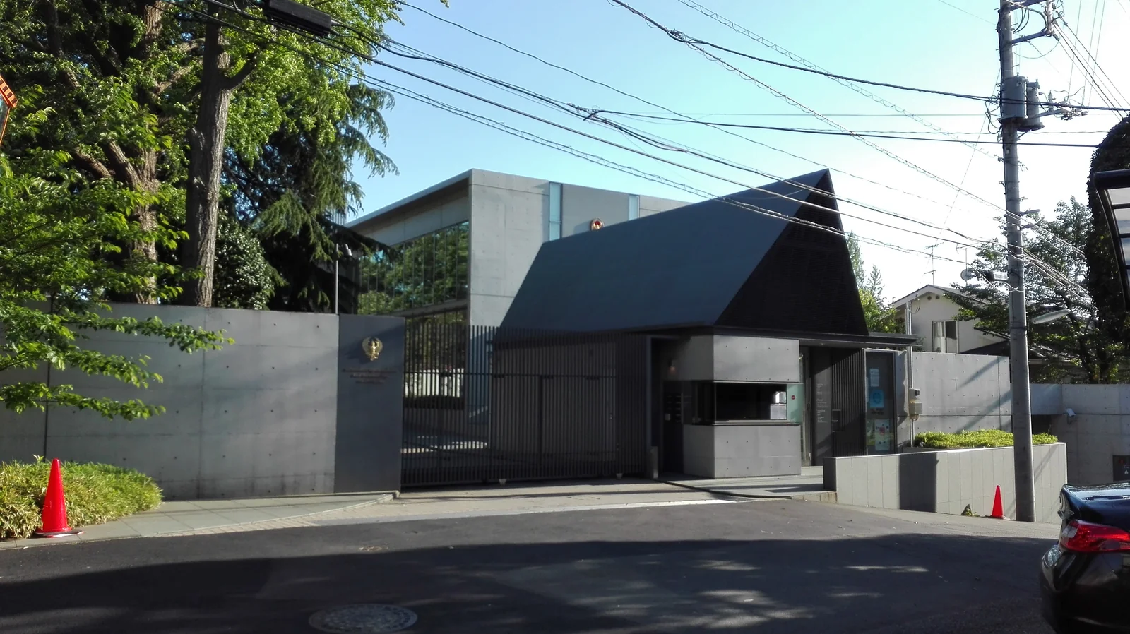 Royal Thai Embassy building exterior with consular flag