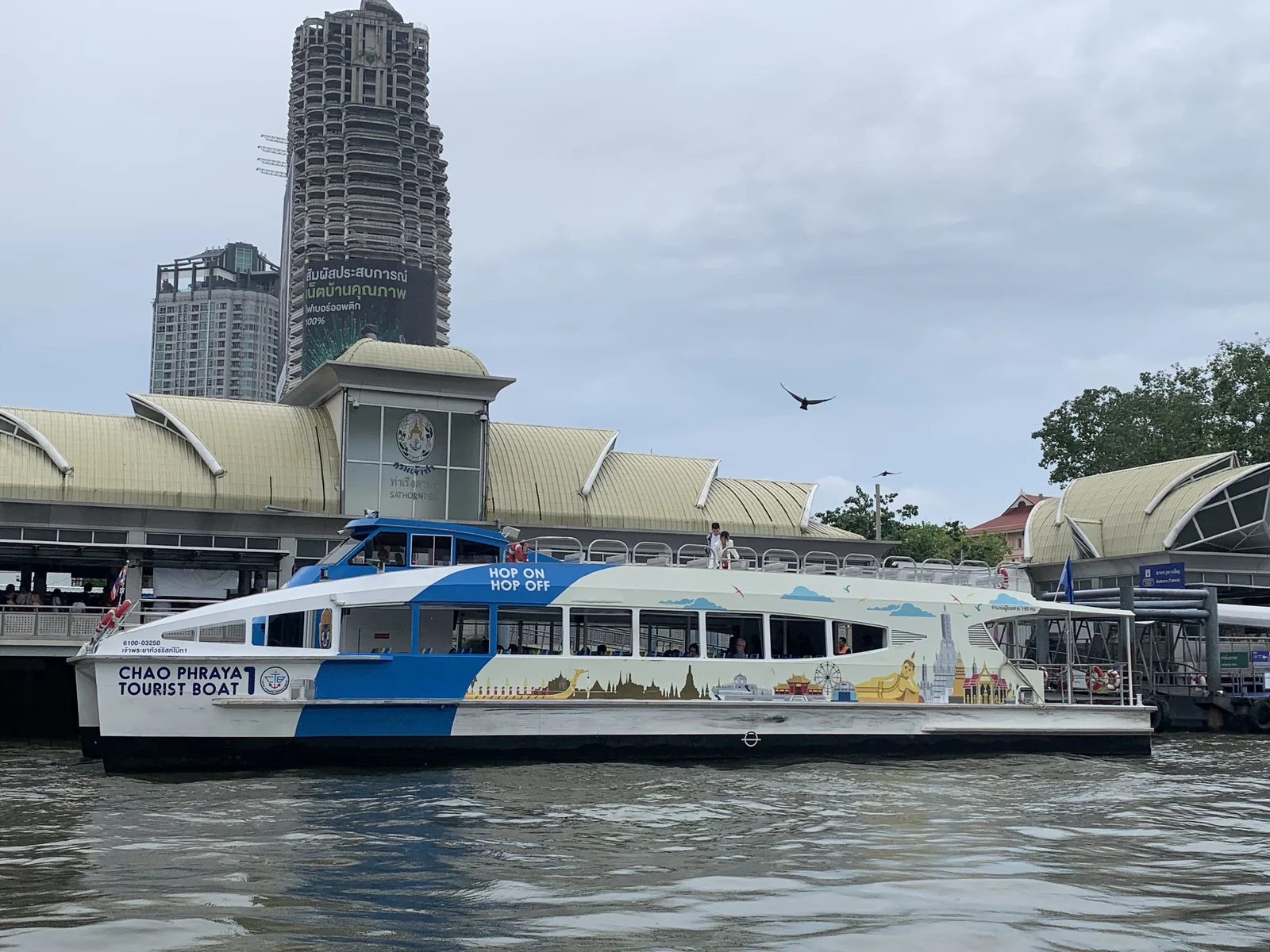 Sathorn Pier Bangkok with Chao Phraya River hop-on hop-off boat and Shangri La shuttle dock