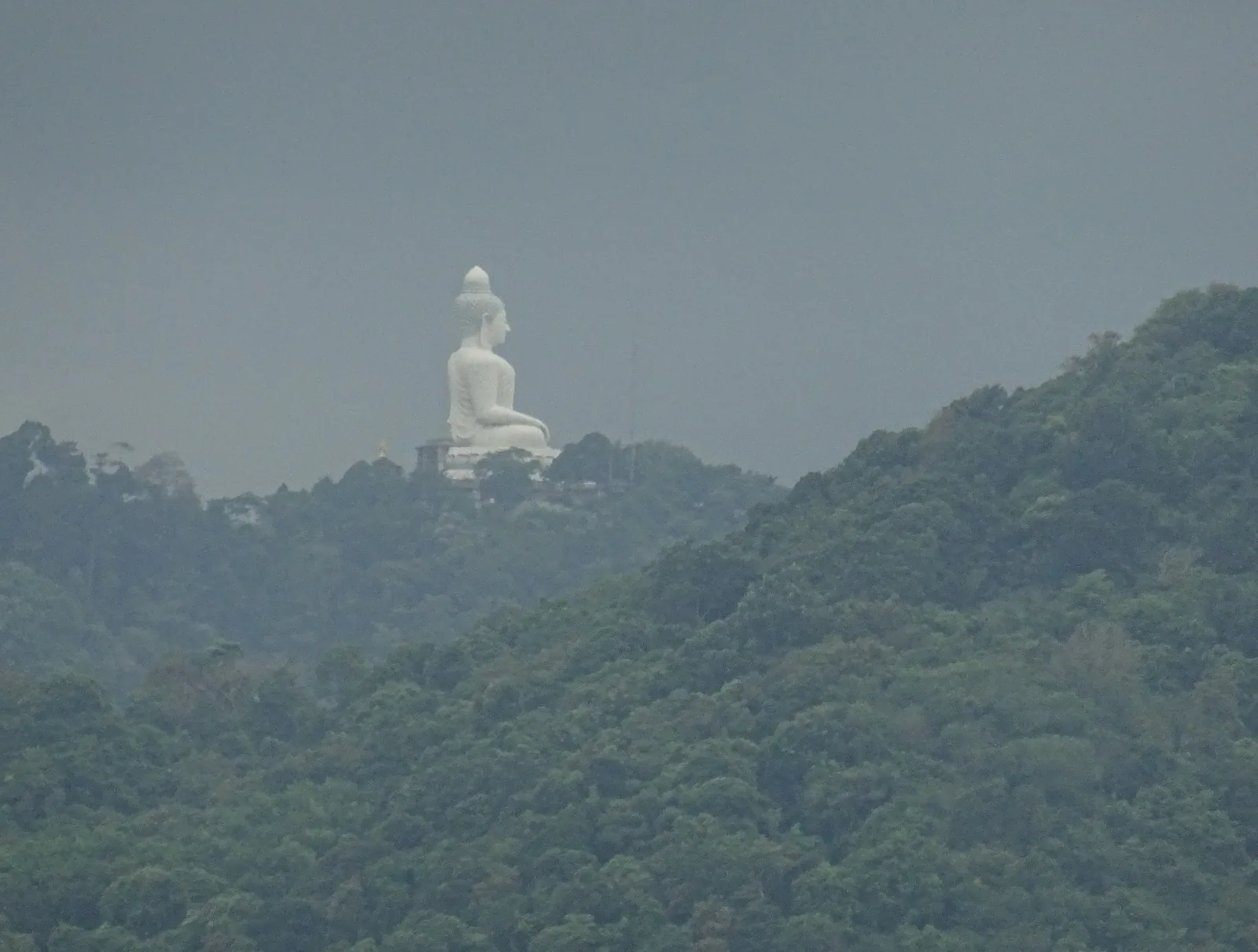 Big Buddha statue on Nakkerd Hill Phuket viewed from Windmill Viewpoint