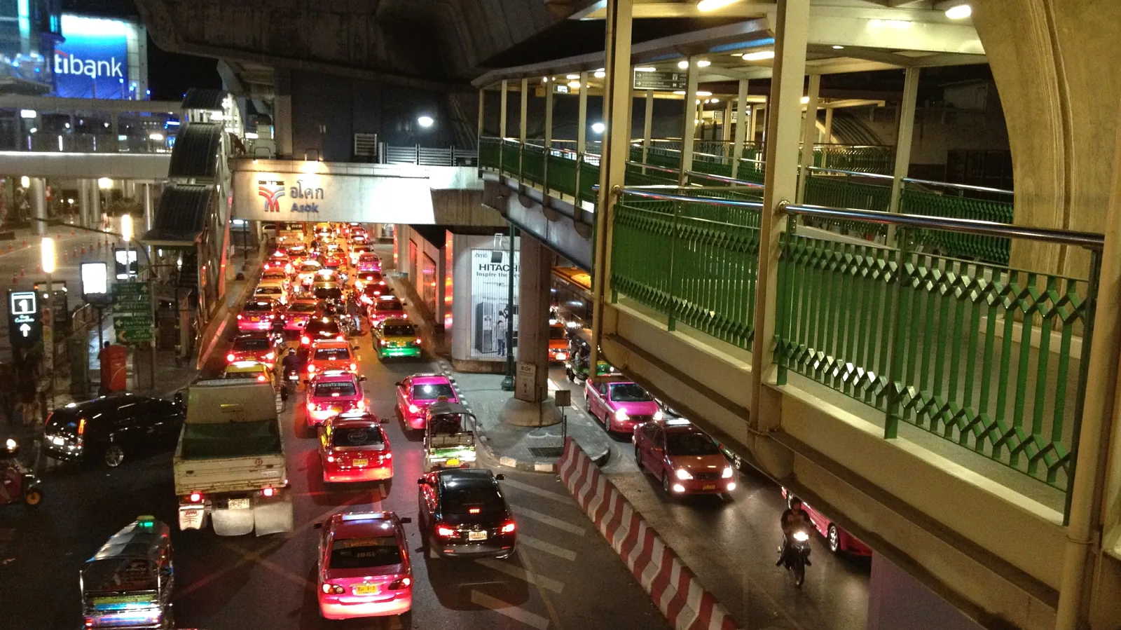 BTS Skytrain Asok interchange station elevated above Sukhumvit Road Bangkok