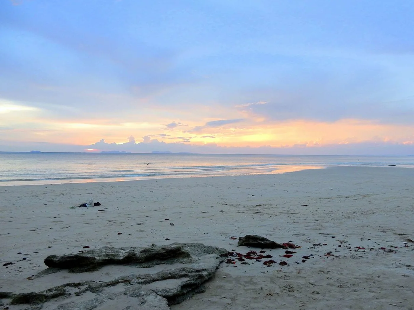 Wide sandy stretch of Phra Ae Long Beach on Koh Lanta at low tide