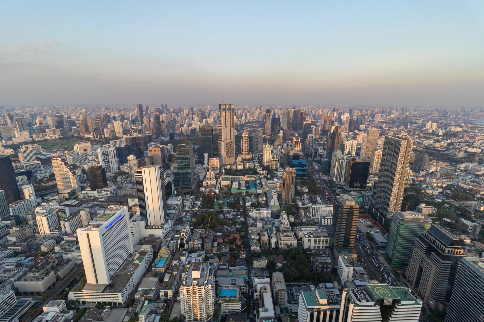 Bangkok skyline looking toward Lumphini Park and the Sathorn financial district where Banyan Tree Bangkok stands