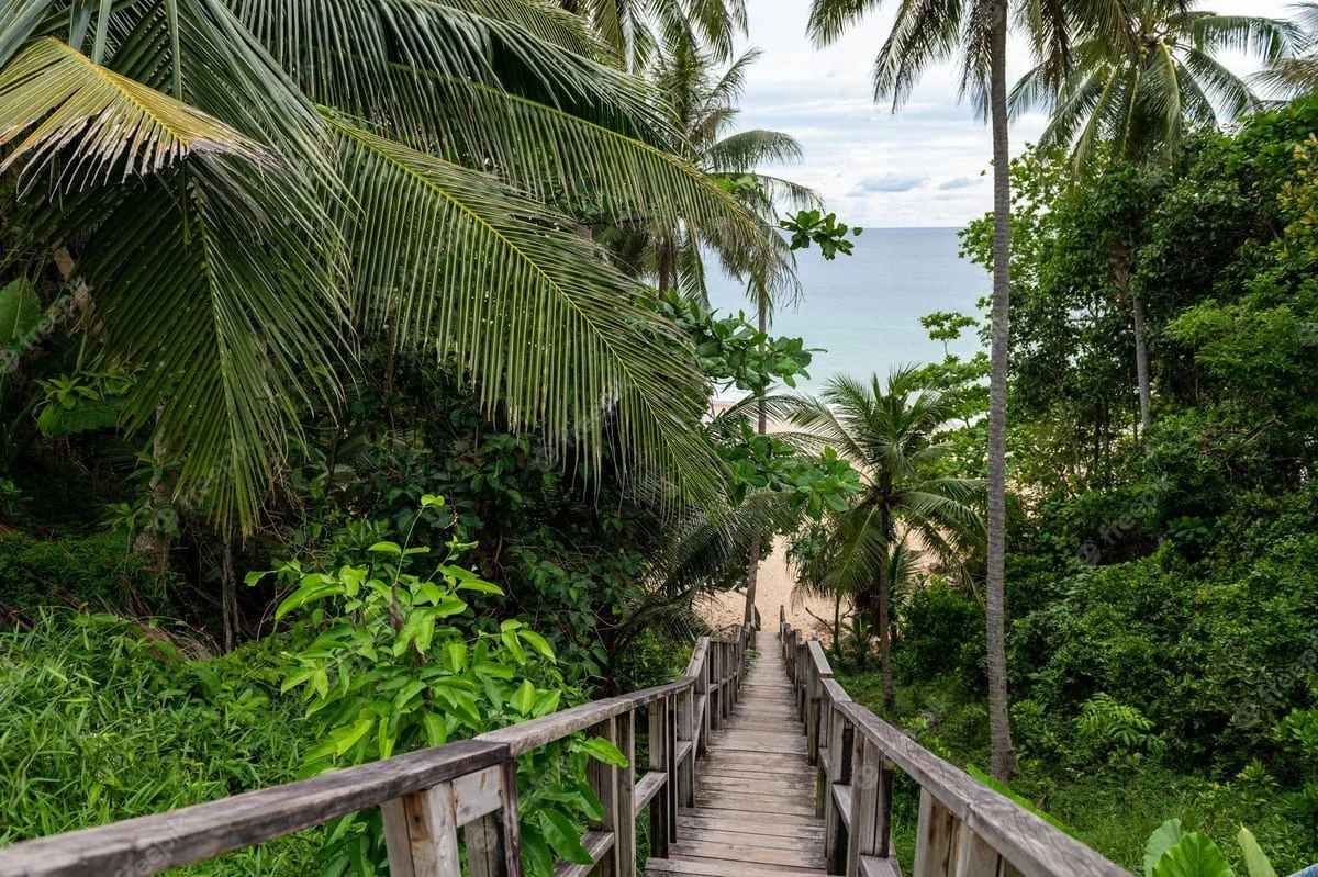 Wooden pier over the water at Nai Thon beach on Phuket's northwest coast
