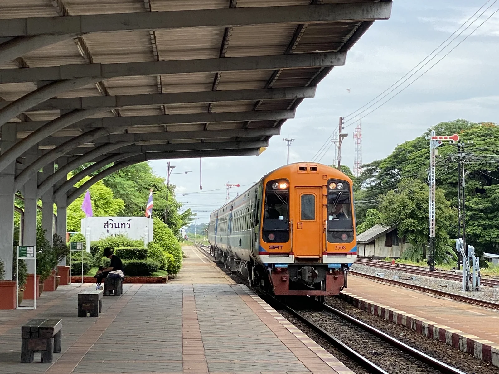A State Railway of Thailand express train at a regional platform