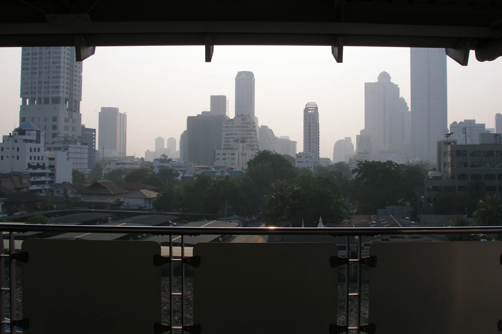 Bangkok skyline at dusk, the arrival point for most Thailand hotel trips