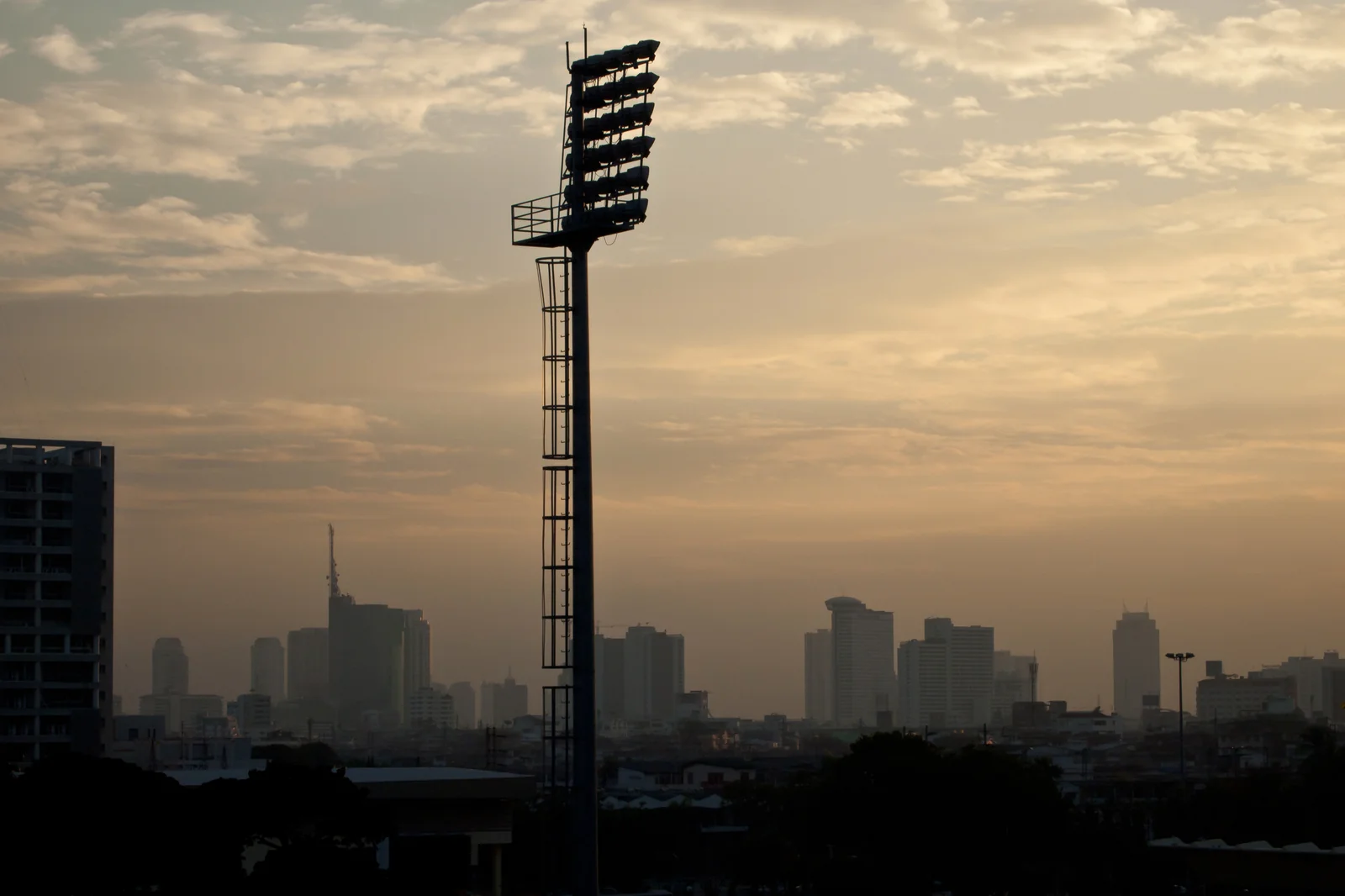 Bangkok skyline at sunset over the Chao Phraya river hotel district