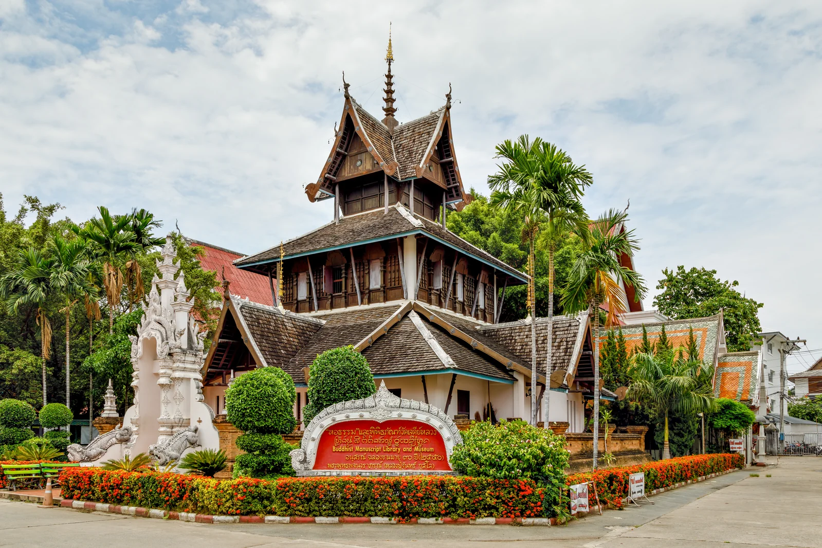 Chiang Mai Old City temple and moat in the early morning, where overnight buses from Bangkok arrive around dawn