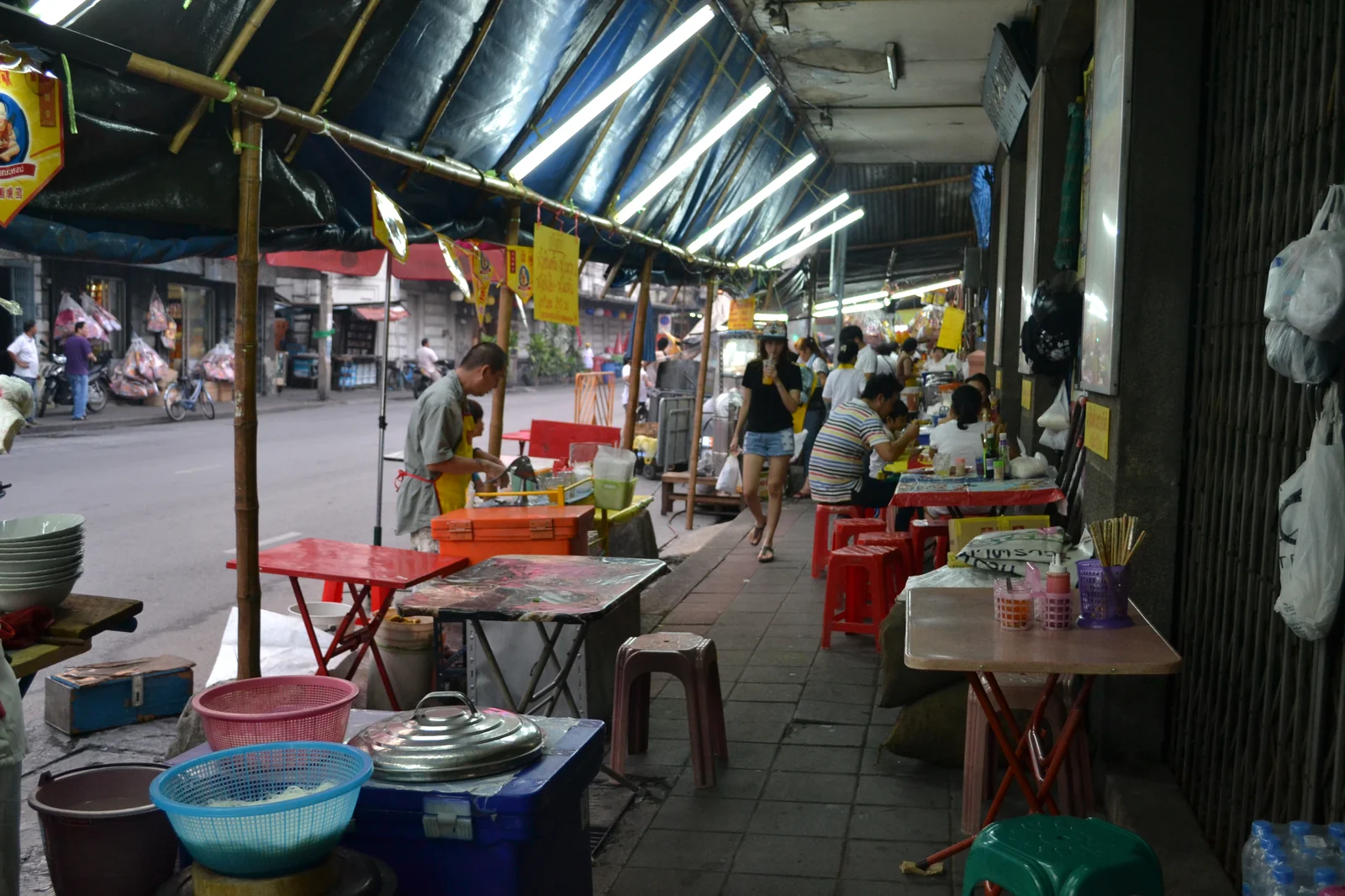 Evening street scene in Bangkok near the Banglamphu area where tourist coaches to Krabi board