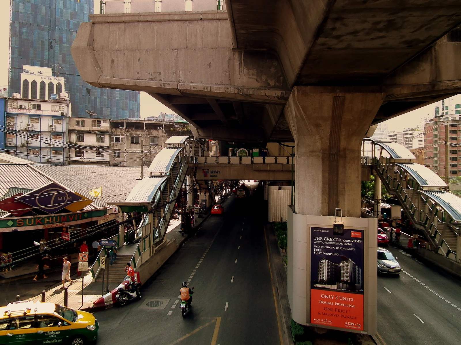 Nana Skytrain station on Sukhumvit Road, connected to the Hyatt Regency Bangkok Sukhumvit by a covered skywalk