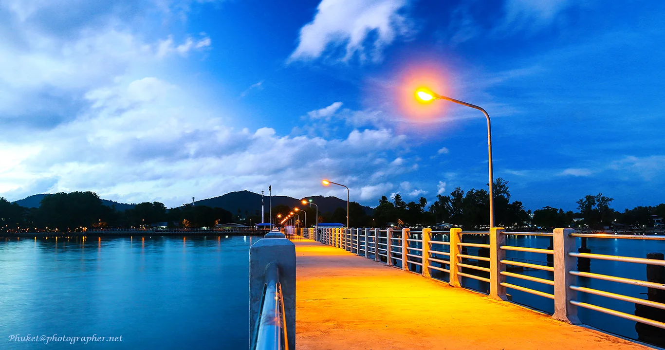 Phuket waterfront pier with longtail boats and Andaman sea, arrival area for overnight buses from Bangkok