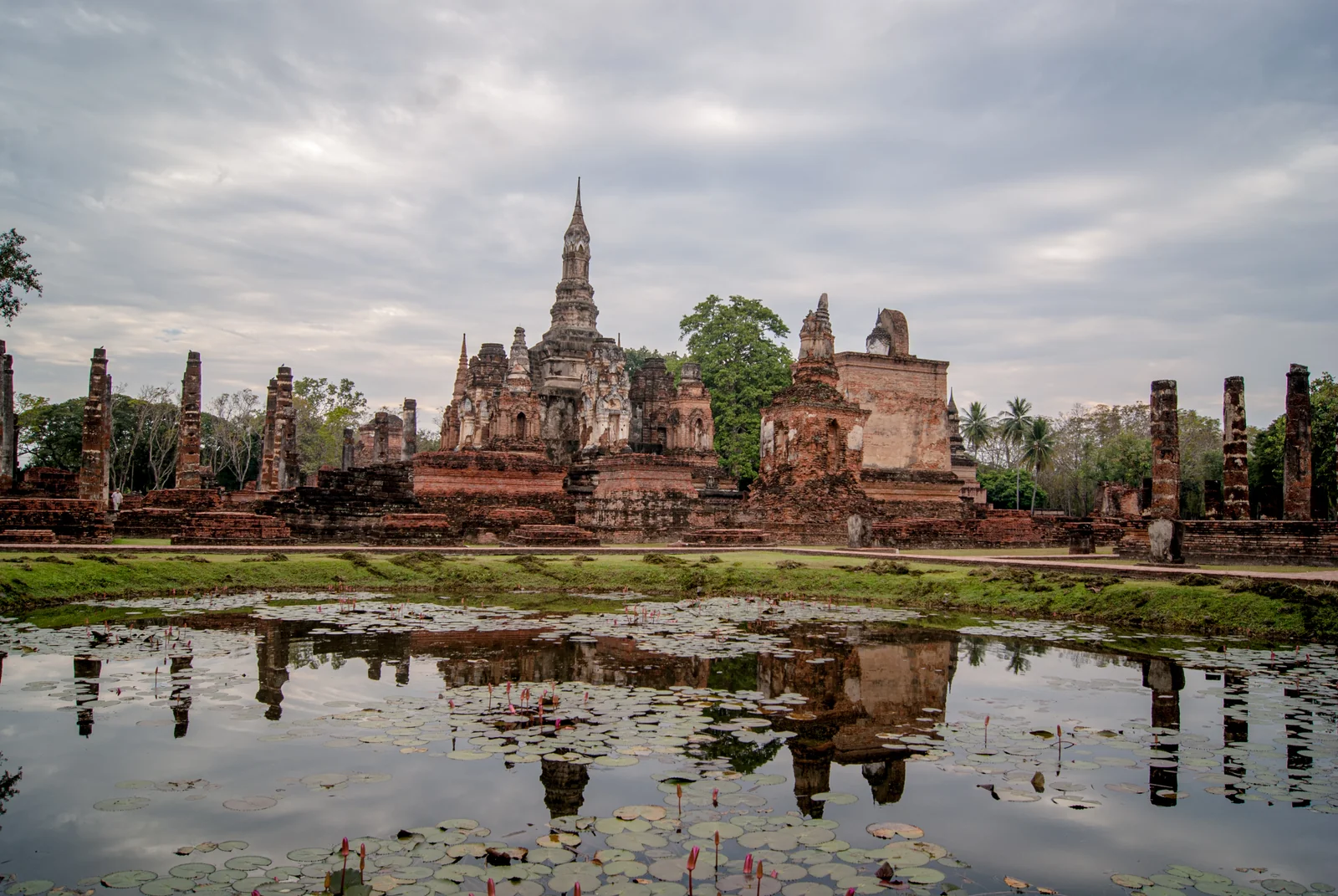 Wat Mahathat and its lotus bud chedi in the central zone of Sukhothai Historical Park, Thailand